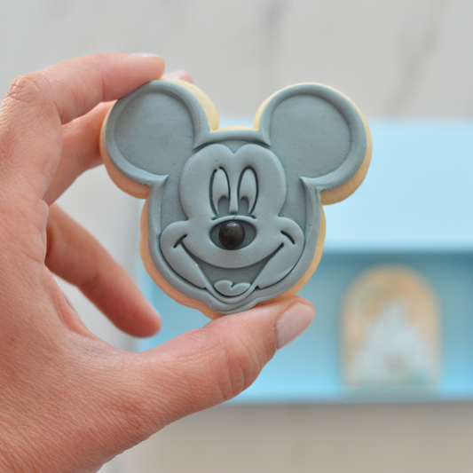Disney light blue gift box open showing Mickey Mouse cookies by Oh Happy Co.