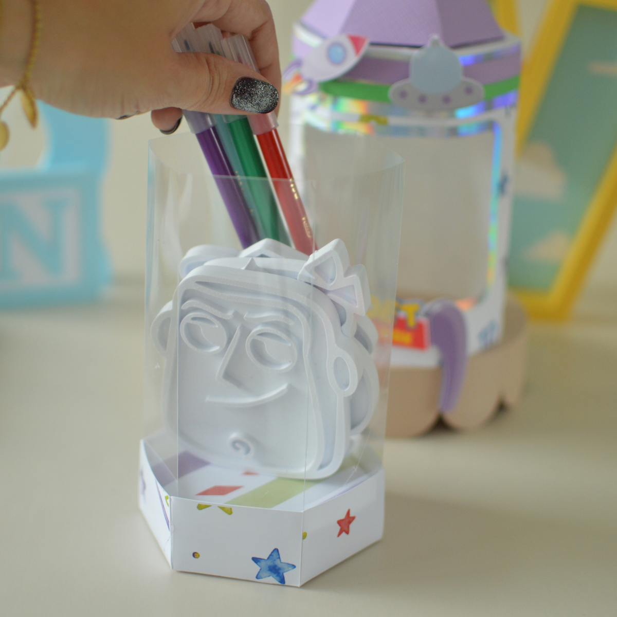 Felt tip pens being added to the activity box