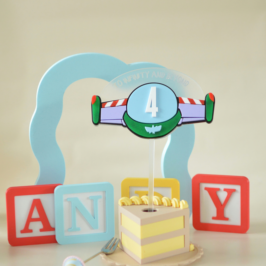 Space adventure number 4 cake topper on a birthday cake slice