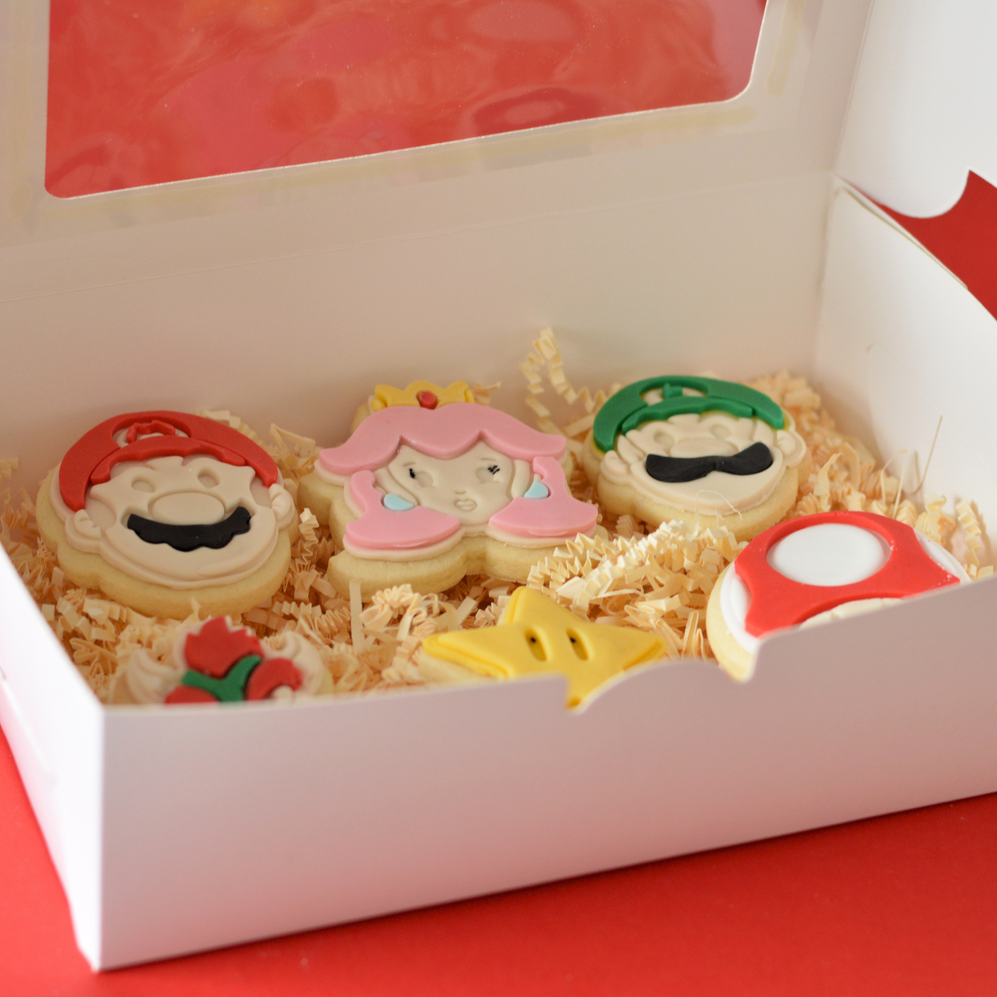 Super Mario themed cookies in gift box by Oh Happy Co.