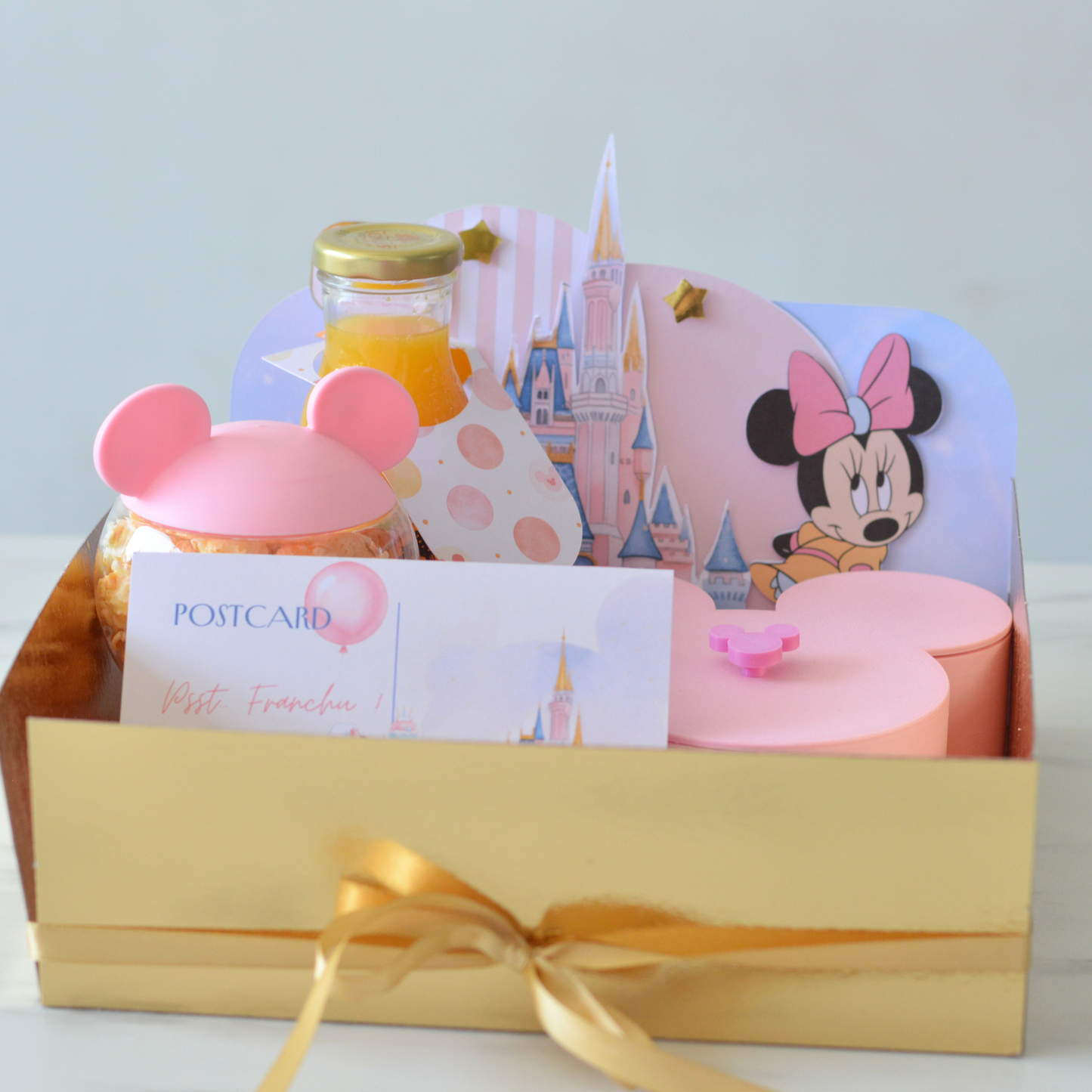 3D Mickey-shaped pink birthday gift box close-up by Oh Happy Co.