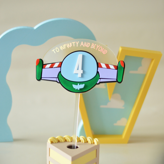 Personalised number cake topper with wings and a name on top