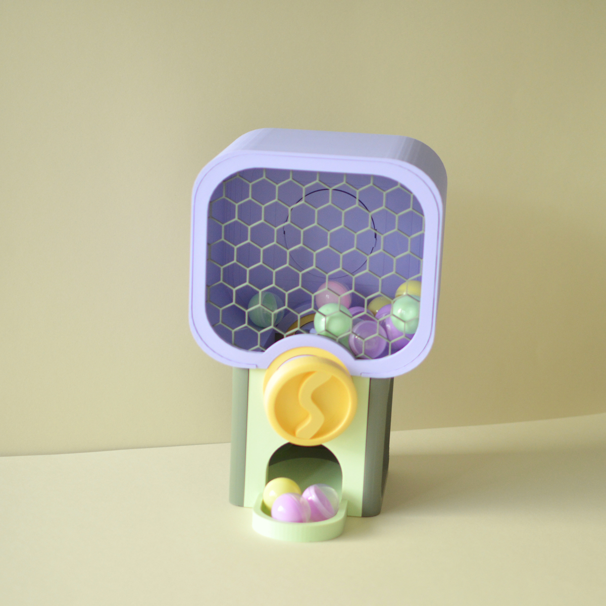 3D printed mini gumball machine in mint, lavender and yellow
