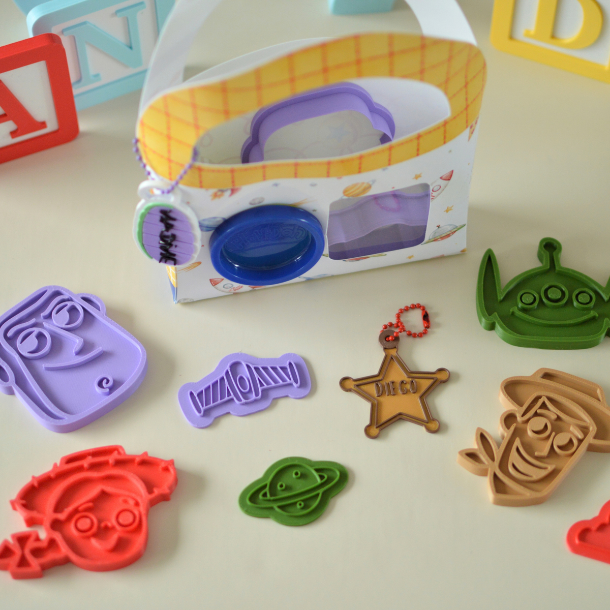 Play dough favour box with cutters spread out around it