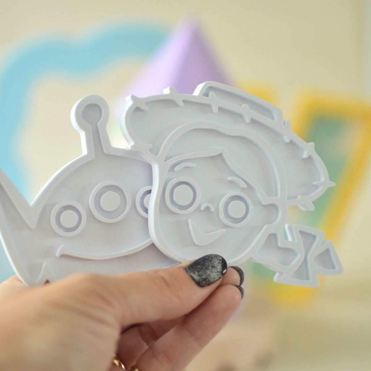Close-up of 3D printed colouring plates for kids