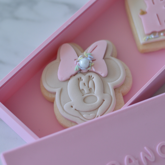 Disney pink gift box open showing Minnie Mouse cookies by Oh Happy Co.